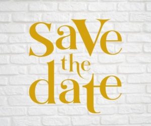brick wall painted white with words save the date on top