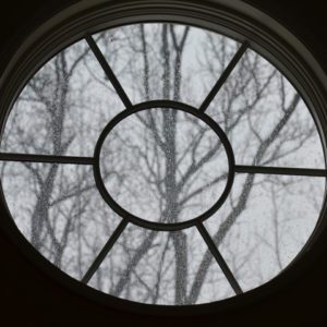 a circle window in the snow