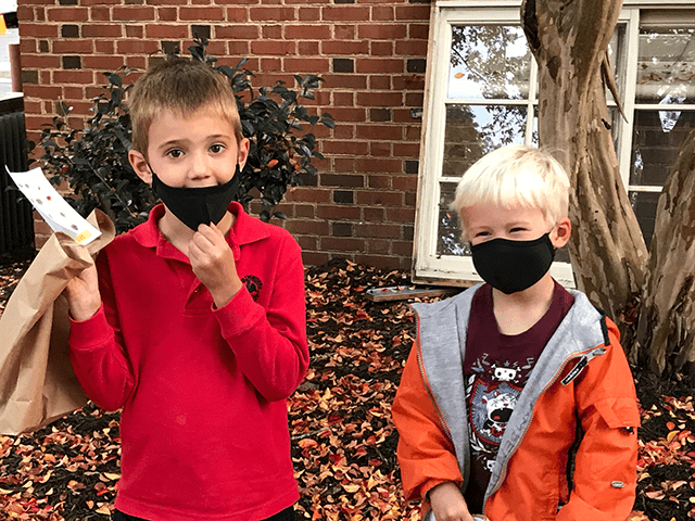two kids in masks