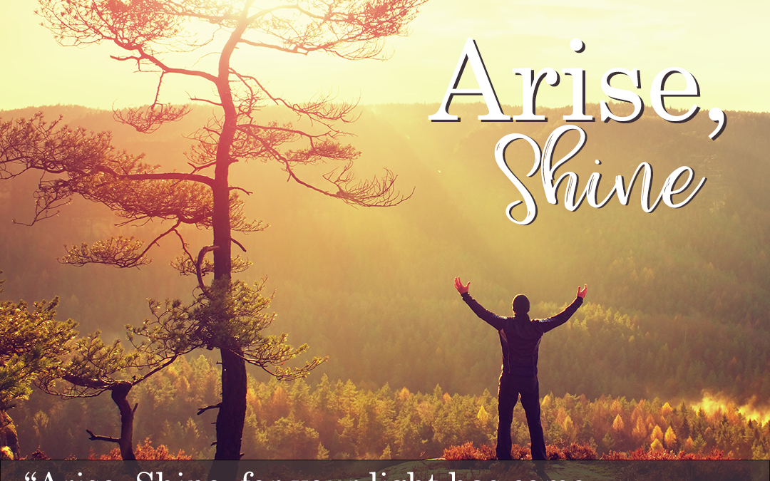 arise, shine stewardship, man on a mountain raised hands to sky