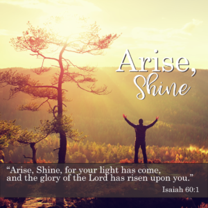 arise, shine stewardship, man on a mountain raised hands to sky